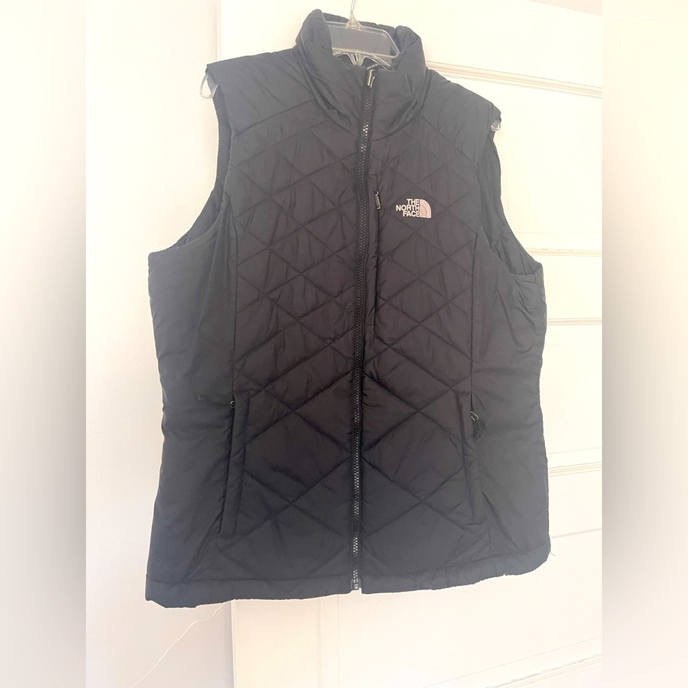 Women’s Black The North Face vest; size large.